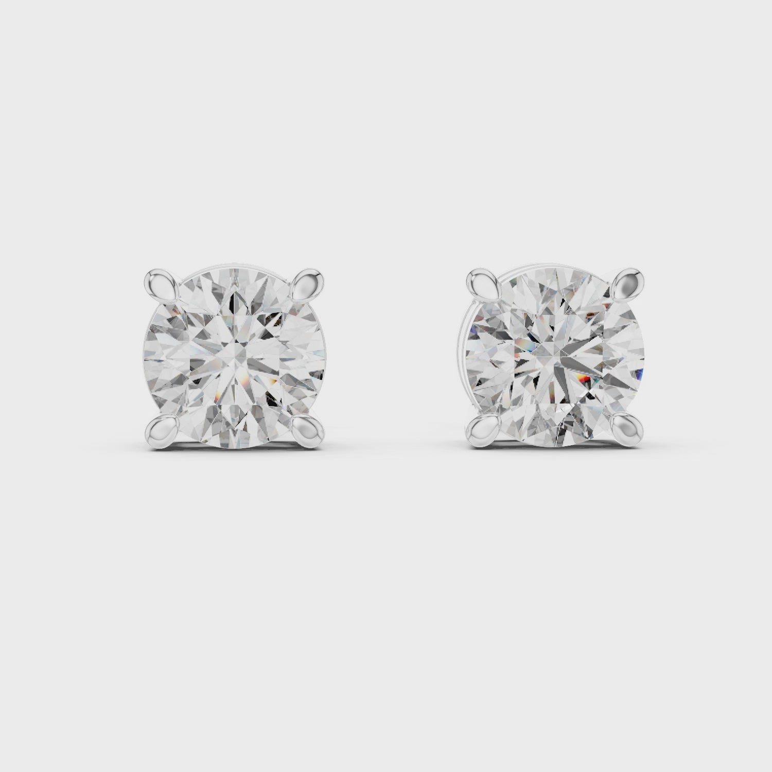 Sparkling Luxe 1.25CT Round Diamond Four Prong Earrings in 18KT